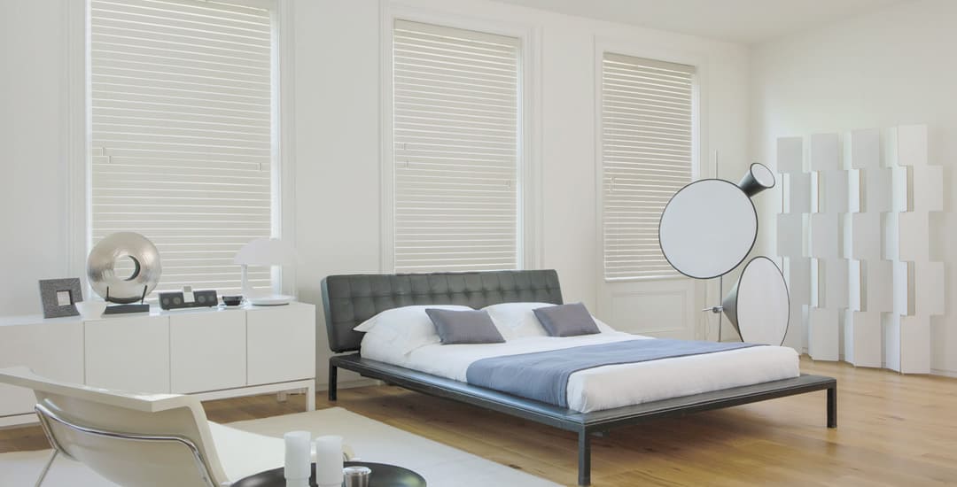 High quality cream faux wood blinds in bedroom