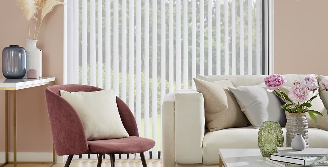 Open white vertical blinds in living room