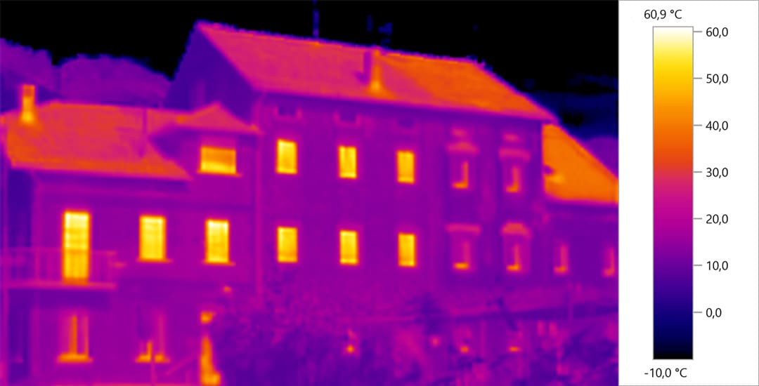 Thermal infrared image showing heat loss through windows without blinds