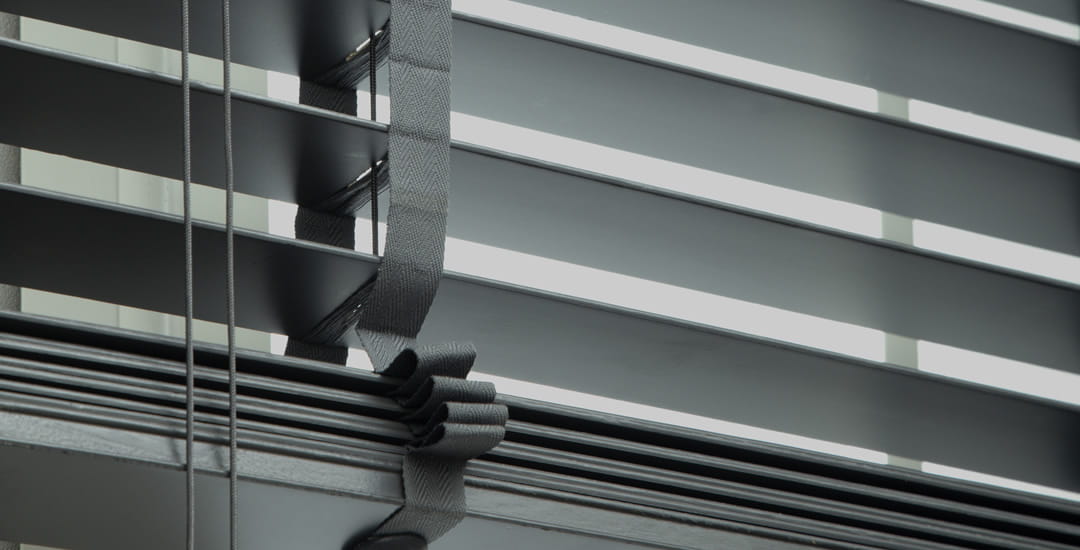 Closeup of 50mm black wooden venetian blinds