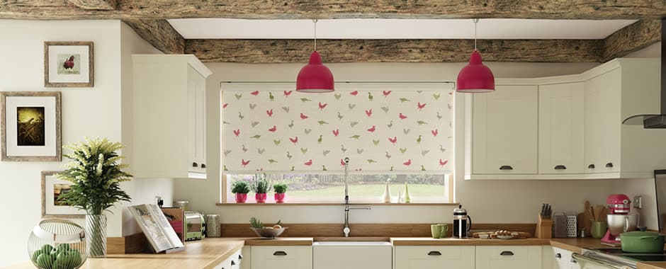 Farmhouse style kitchen with cream roller blinds