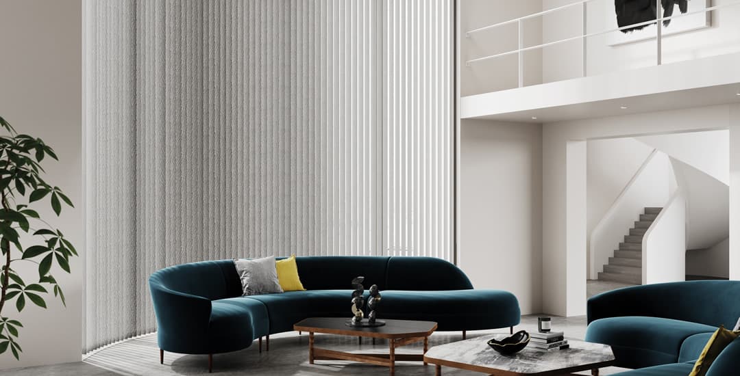 Extremely tall grey vertical blinds in modern double height room