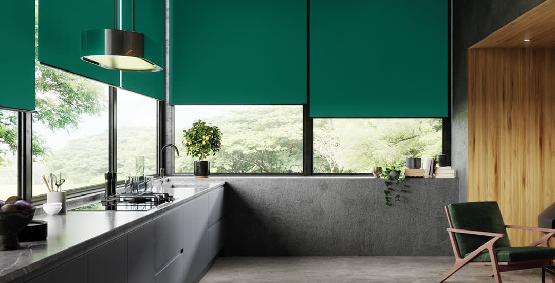 Luxury green roller blinds in high end modern kitchen