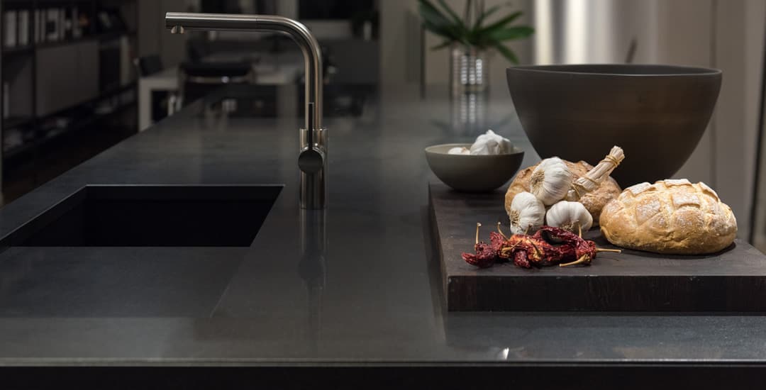 Dark Stylish kitchen with black granite stone worktop