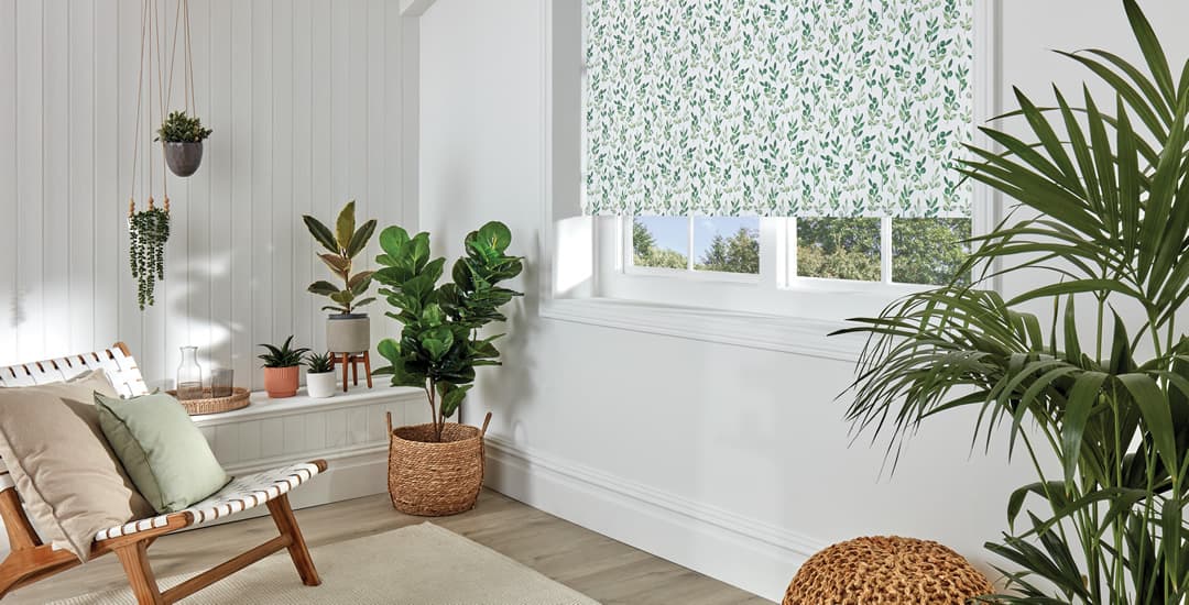 Wood themed room with green floral roller blinds
