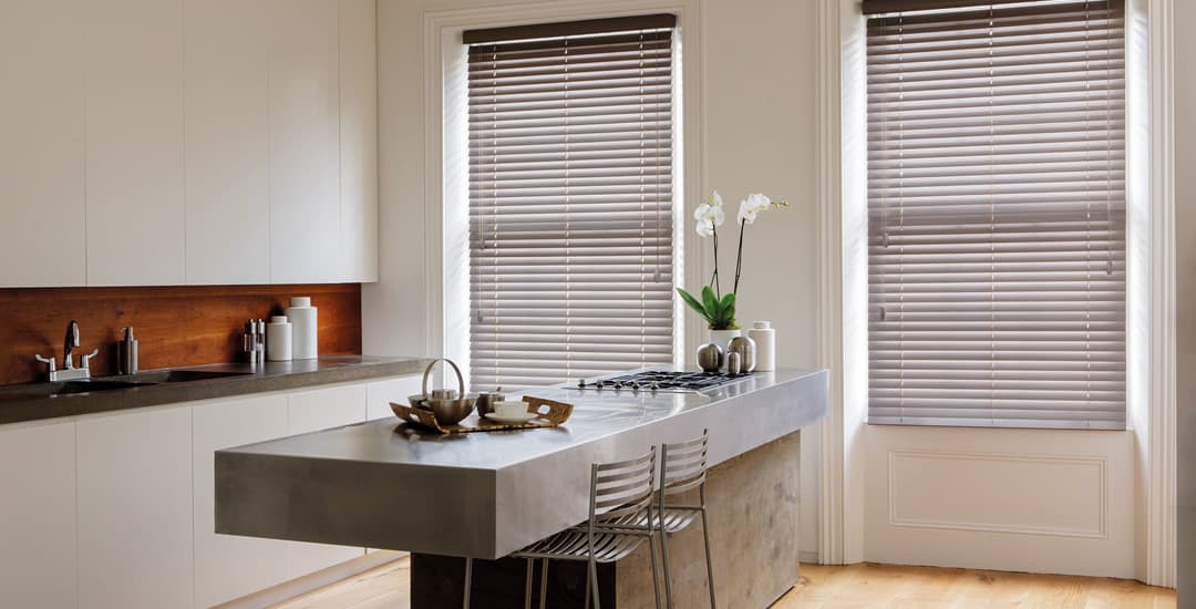 Luxury grained wooden blinds in modern kitchen