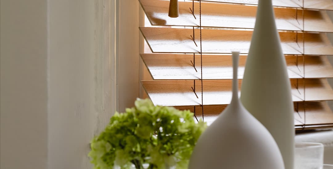 Real wood blinds in kitchen window