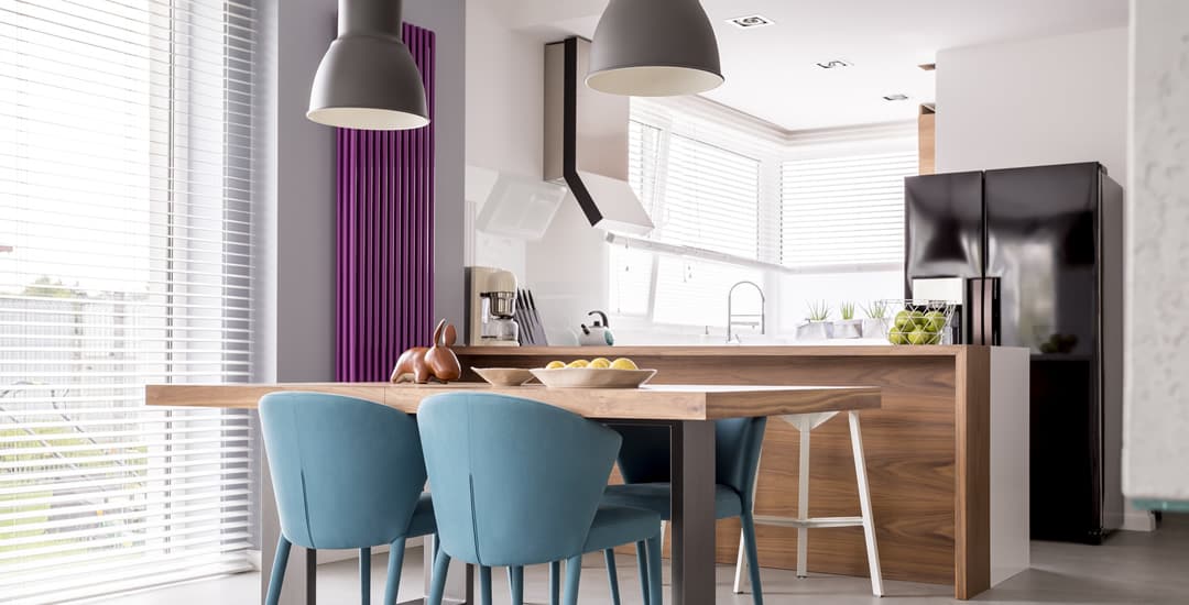 White wooden blinds in spacious kitchen