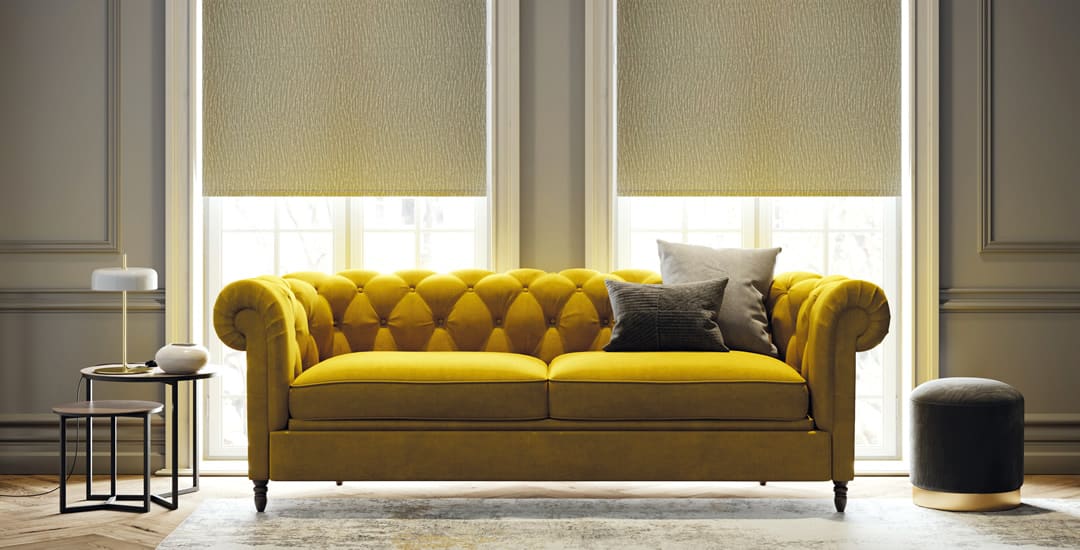 Luxury textured roller-blinds in living room with yellow sofa