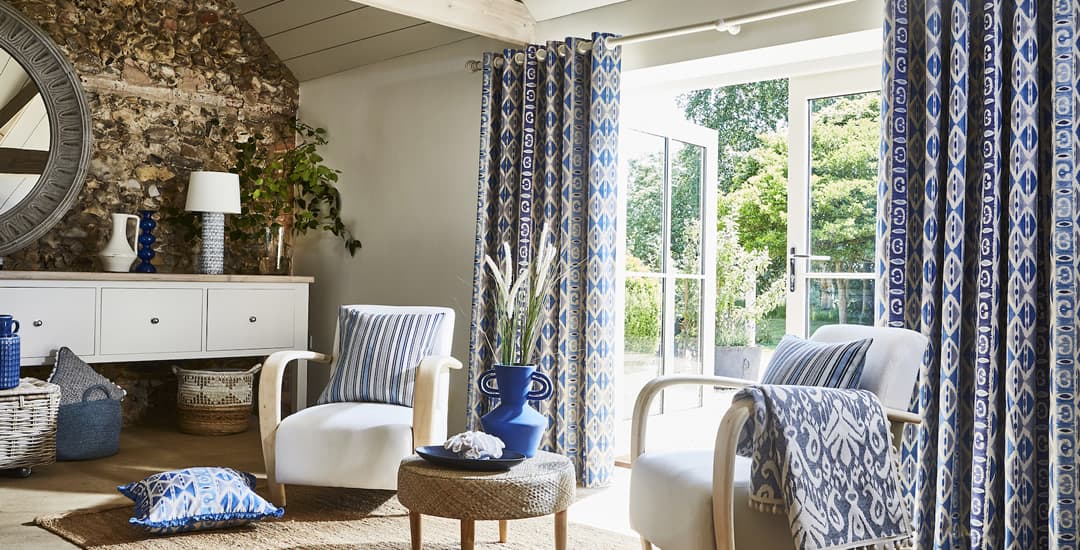 Blue patterned curtains in luxury sitting room