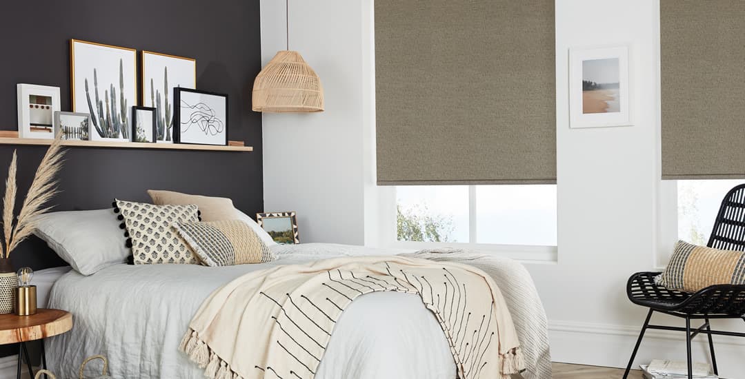 Brown textured blackout blinds in cosy bedroom