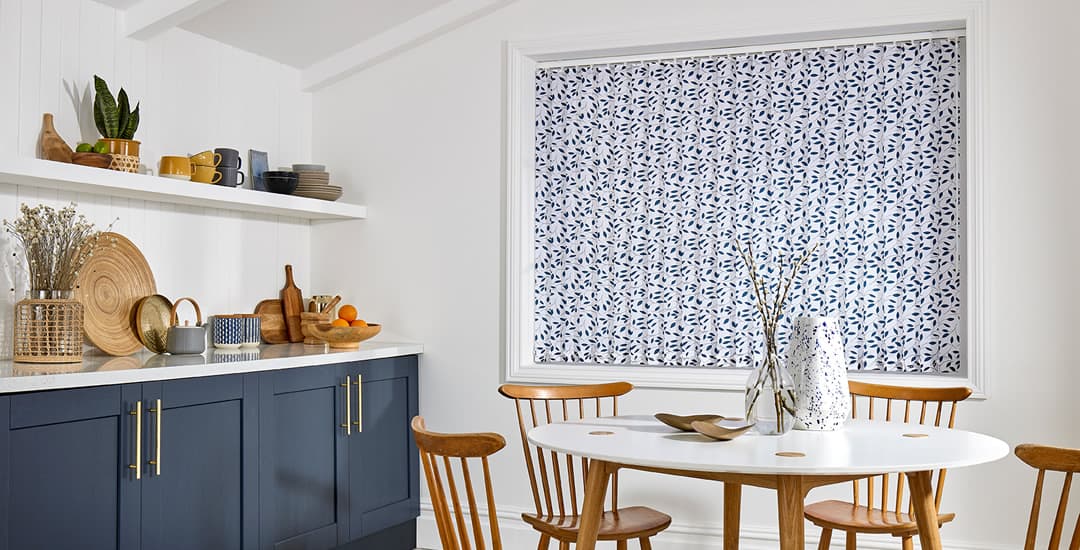 Blue and white floral-patterned vertical blinds in contemporary kitchen