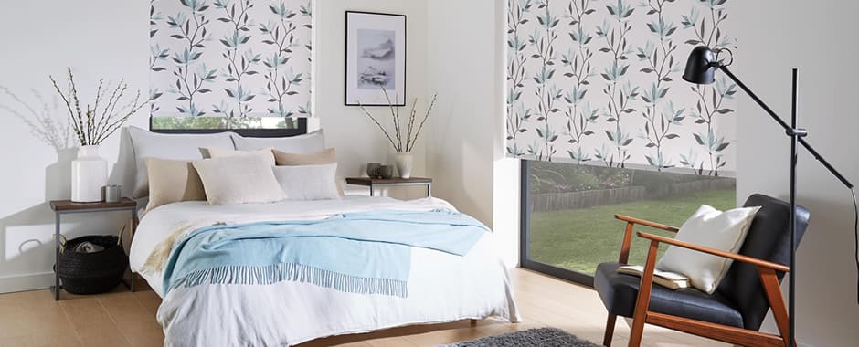 Lily patterned blackout roller blinds in bedroom