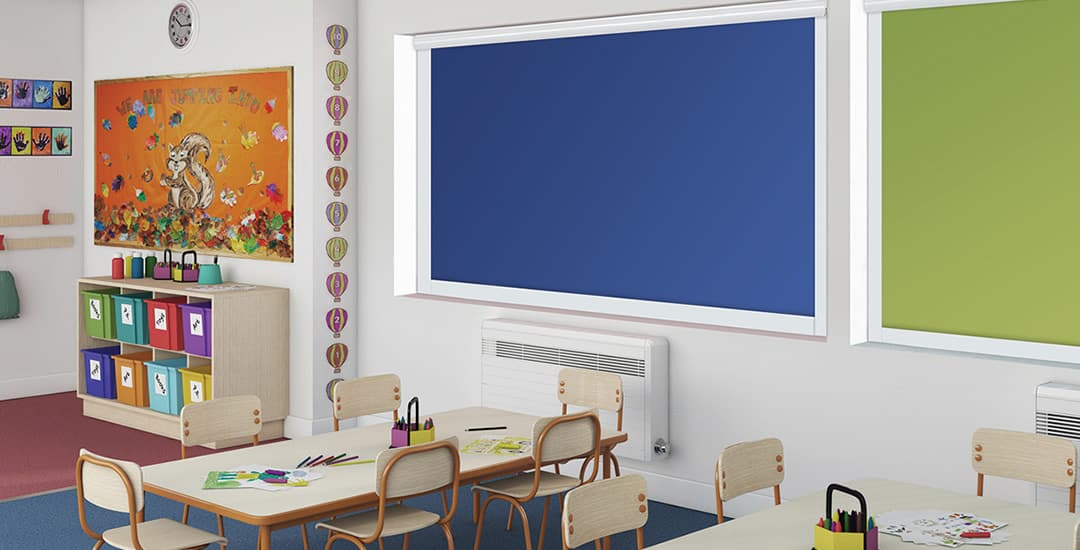 Colourful commercial blackout roller blinds in school classroom