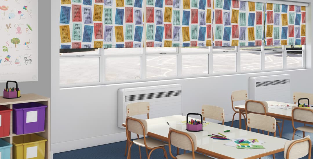 Times tables patterned blackout roller blinds in school classroom