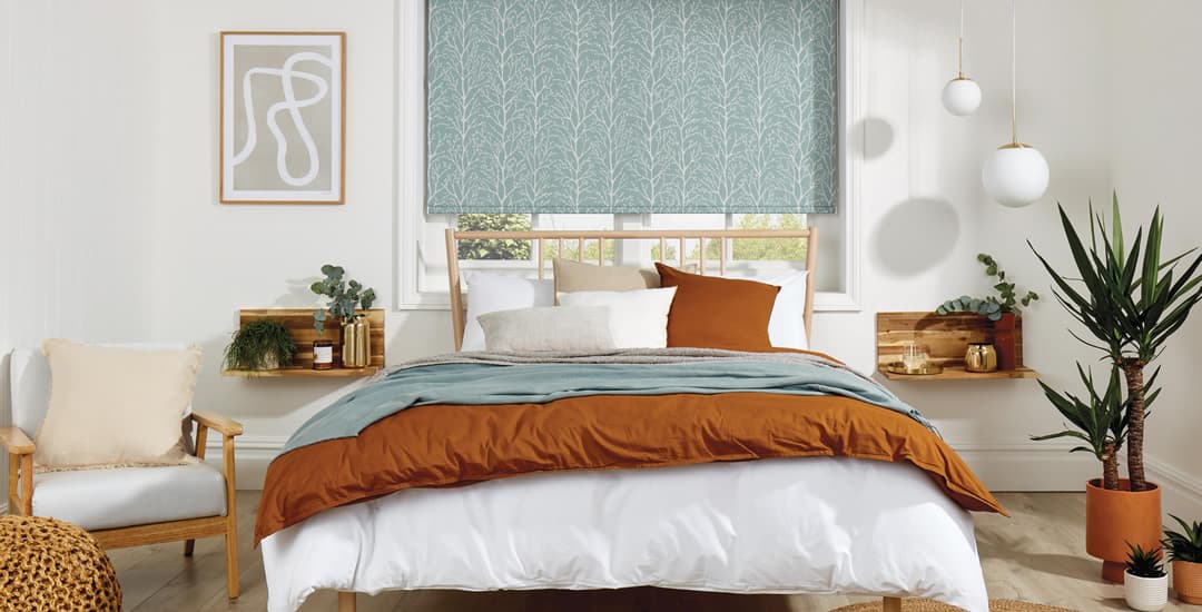 luxury-duck-egg-floral-patterned-blackout-roller-blind-in-bedroom