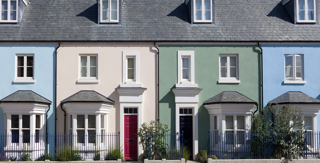 Row of colourful terrace houses on UK street