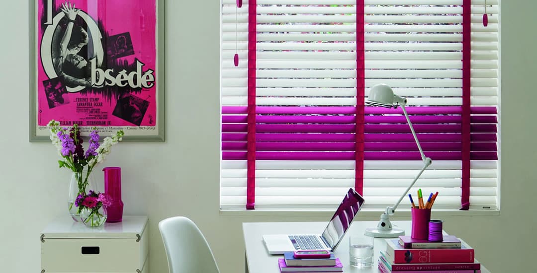 White wooden blinds with contrasting red ladder tapes