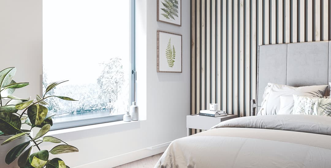 Invisible blinds in a luxury bedroom with wood panelling
