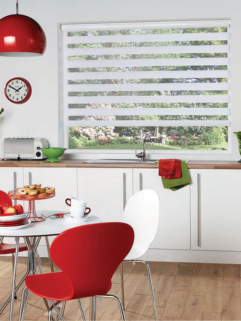 White day and night blinds in modern white and red kitchen