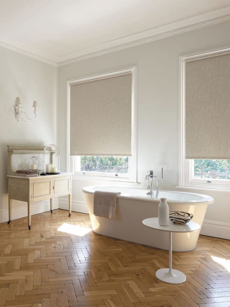 Classically styled vintage bathroom with beige pvc roller blinds