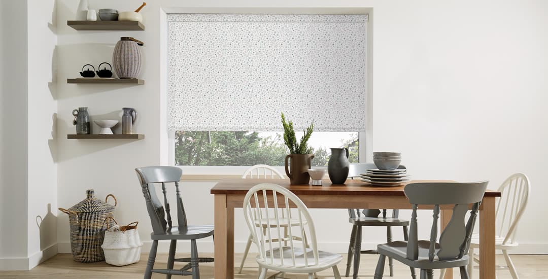Cotton flowers patterned roller blinds in a dining room