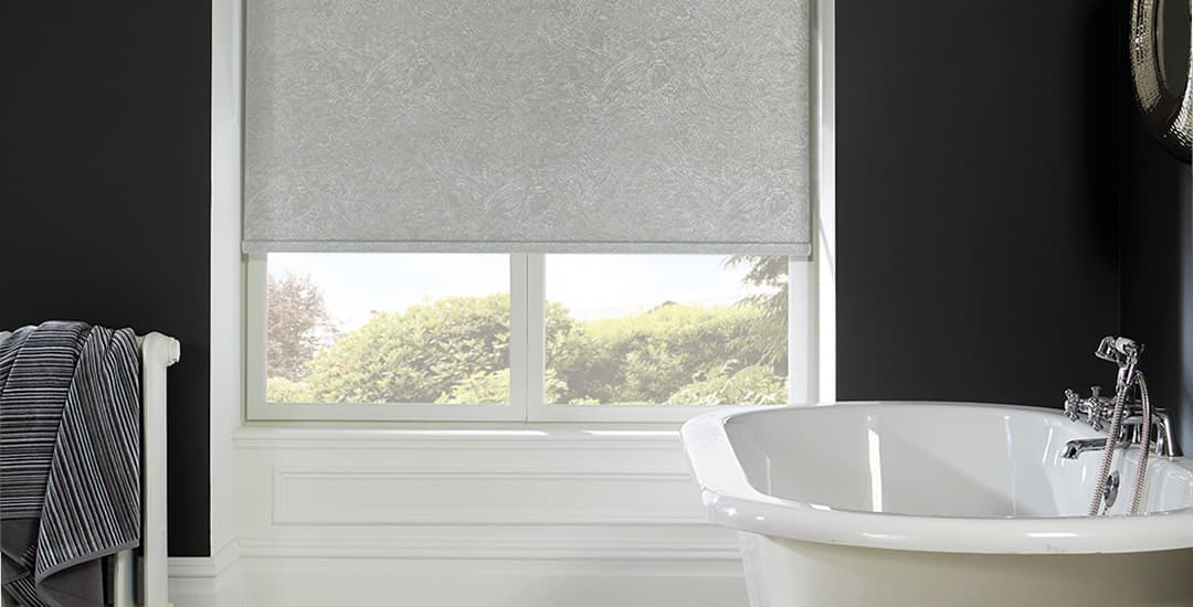 Grey patterned waterproof roller blinds in black traditional bathroom 