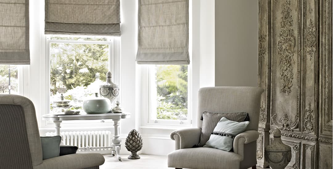 Luxury hessian roman blinds in a traditional living room