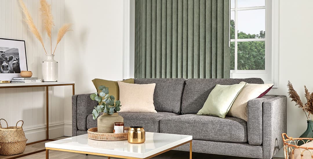 Luxury made-to-measure green vertical blinds in a living room