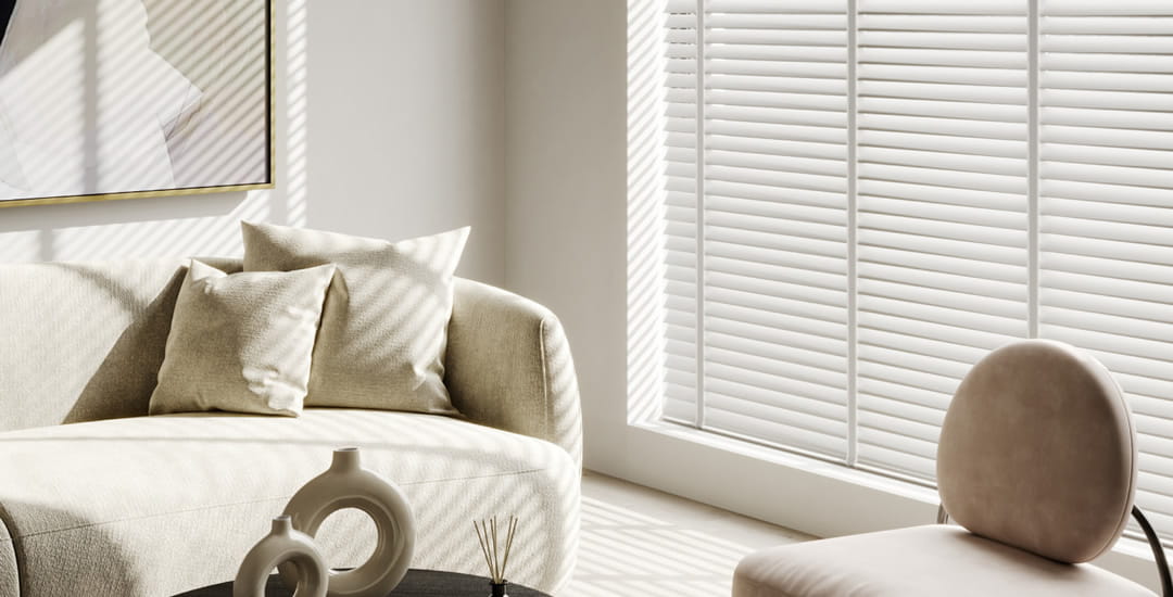 Luxury off white wooden blinds with tapes in a cream living room