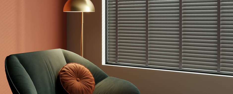 Luxury real wooden blinds with coordinating ladder tapes in a modern orange sitting room