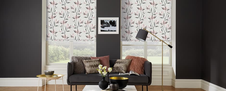 Lily patterned roller blinds in a dark brown living room
