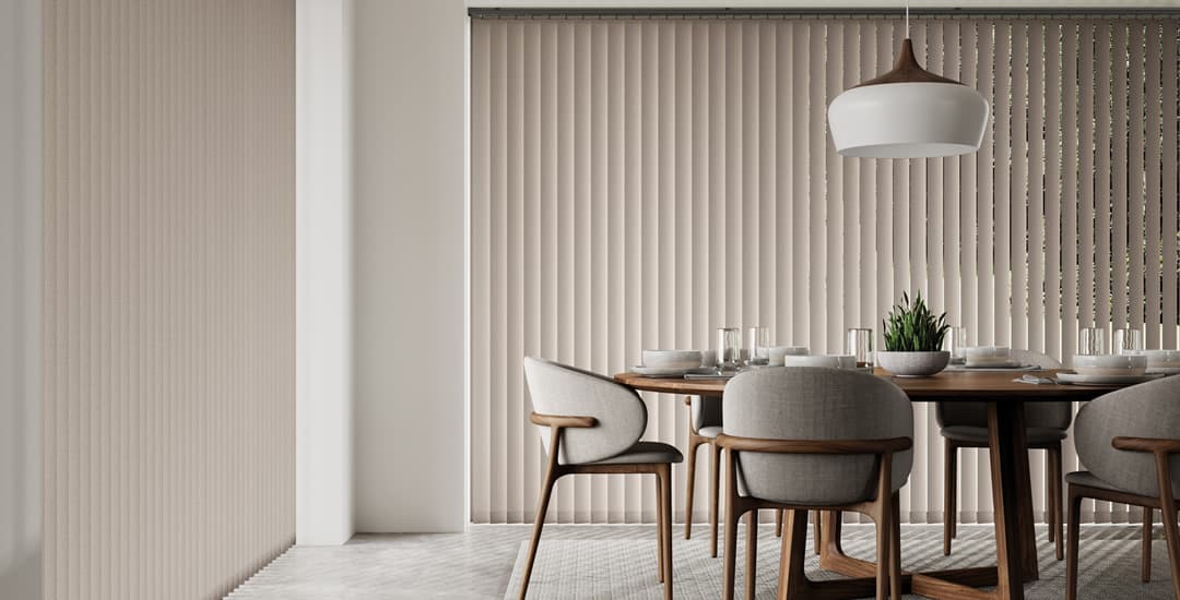 Beige vertical blinds in a large luxury dining room window