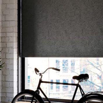 Black and silver marble PVC roller blinds in an apartment windows