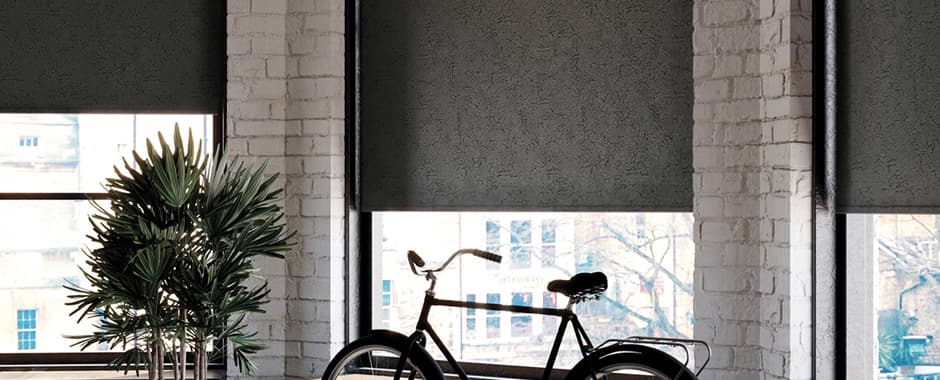 Black and silver marble PVC roller blinds in an apartment windows