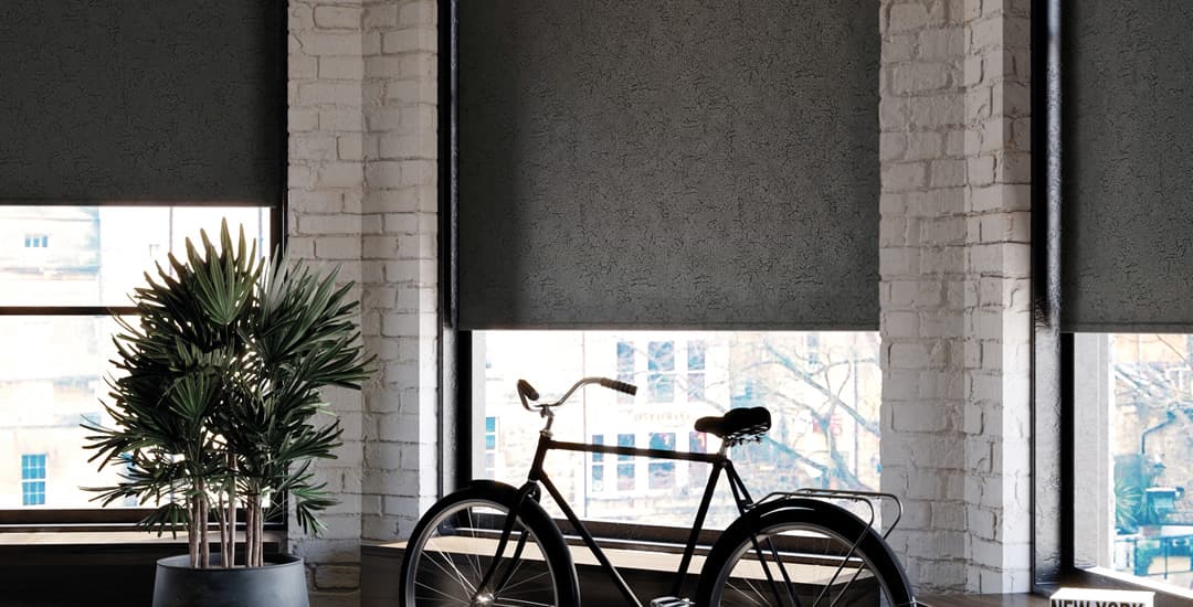 Black and silver marble PVC roller blinds in an apartment's windows