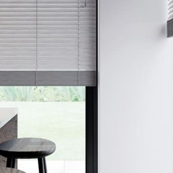 Grey faux wooden blinds in a modern kitchen