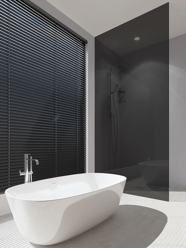 Black waterproof faux wood blinds in a modern bathroom