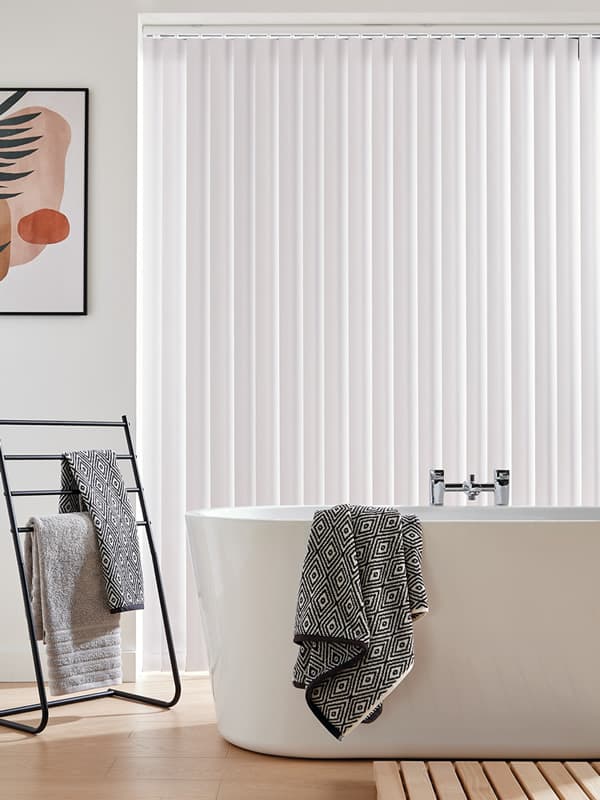 White waterproof PVC vertical blinds in a modern bathroom