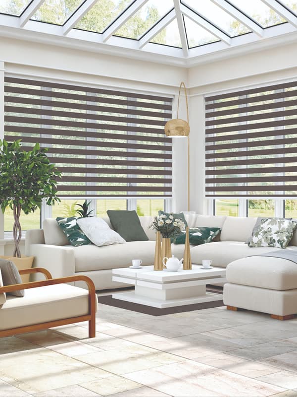 Grey day and night blinds in a Birmingham conservatory