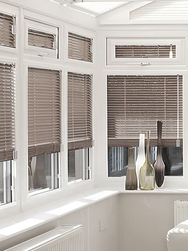 High quality real wooden blinds in conservatory