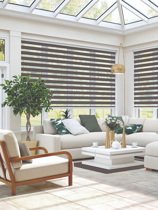 Luxury anthracite grey day and night blinds in conservatory