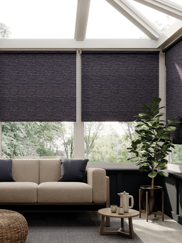 Luxury textured thermal oller blinds in conservatory