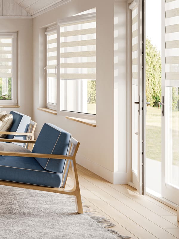 Modern beige day and night blinds in conservatory