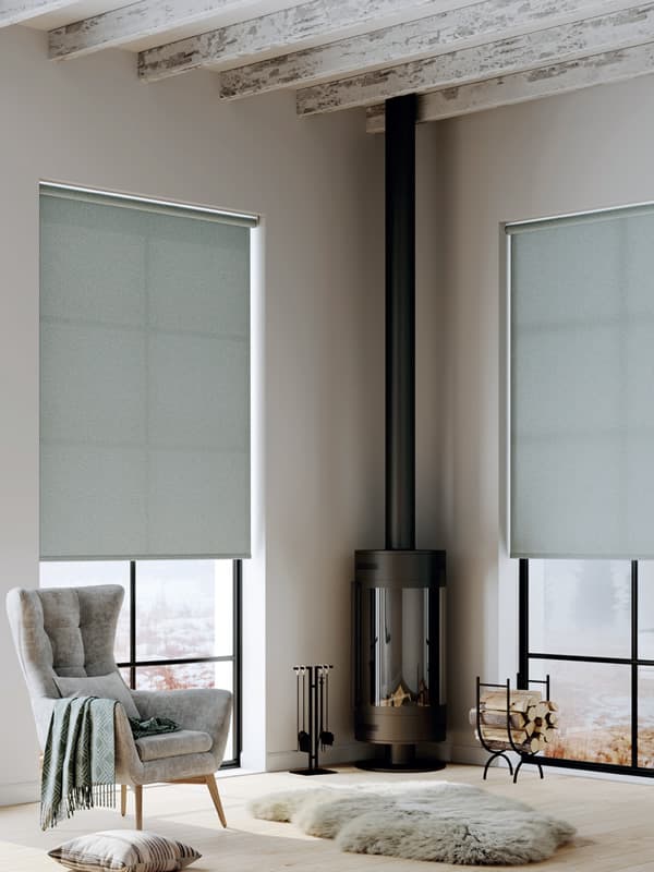 Duck egg fabric roller blinds in rustic sitting room