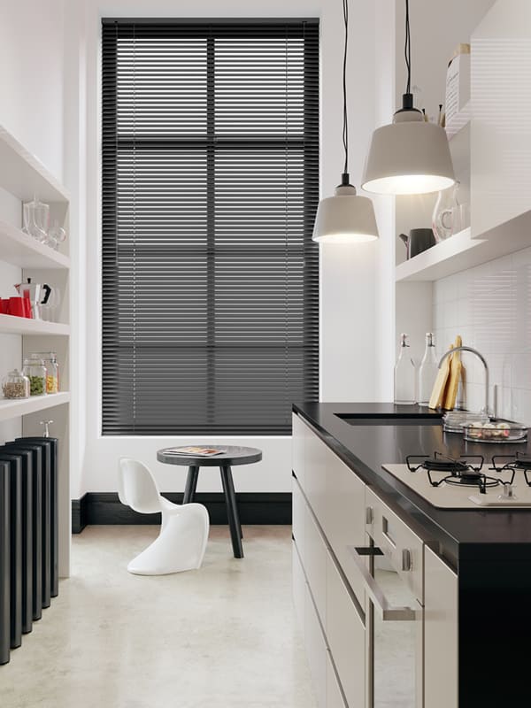 Stylish grey aluminium venetian horizontal blinds in a modern kitchen