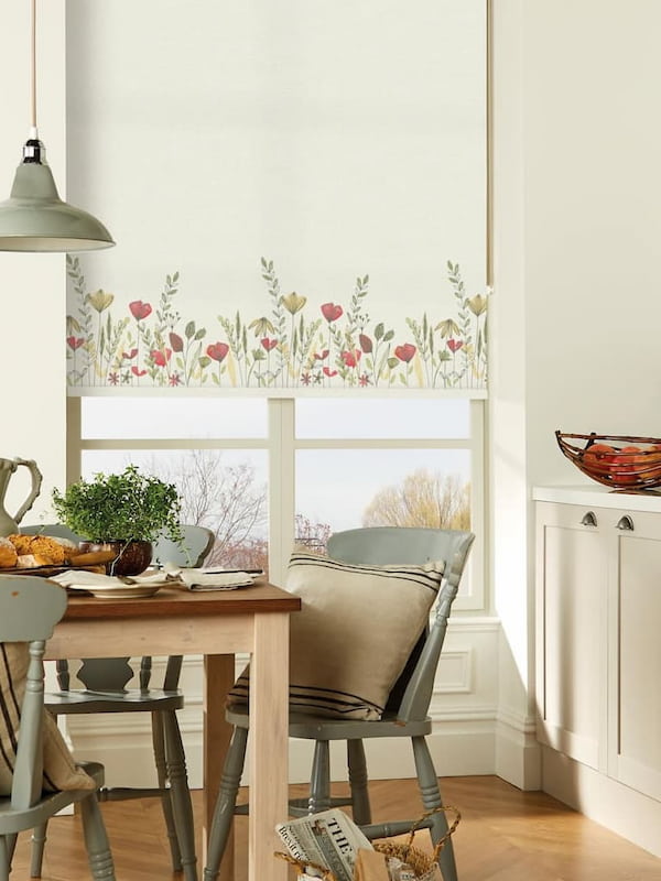 Wildflowers patterned roller blinds in a cream county kitchen diner