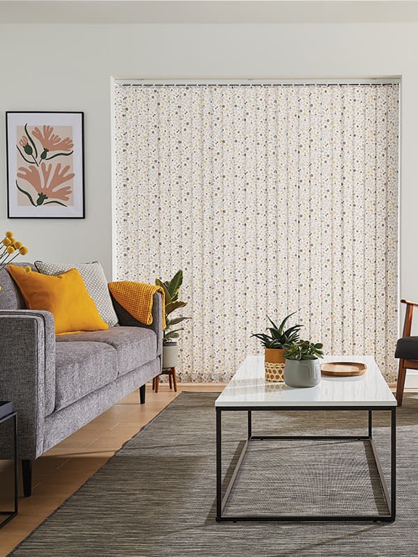 Cream vertical blinds at the patio doors of a modern living room