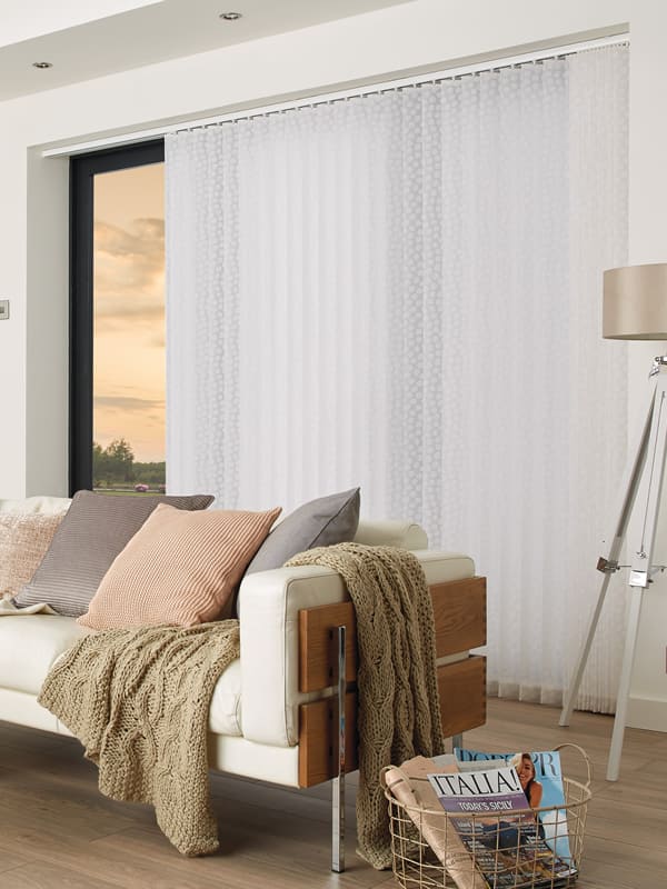 Luxury white patio vertical louvre blinds in a modern living space