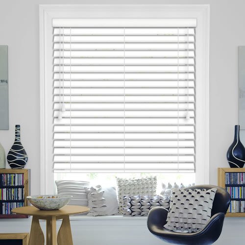 white wooden blinds